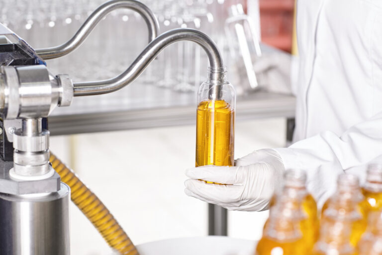 transparent-plastic-bottles-filled-with-yellow-substance